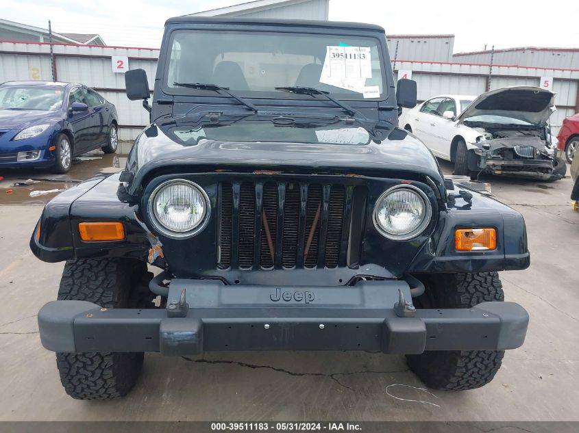 2002 Jeep Wrangler Sahara VIN: 1J4FA59SX2P742726 Lot: 39511183