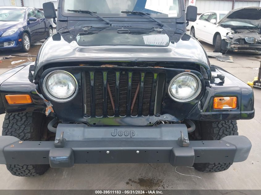 2002 Jeep Wrangler Sahara VIN: 1J4FA59SX2P742726 Lot: 39511183