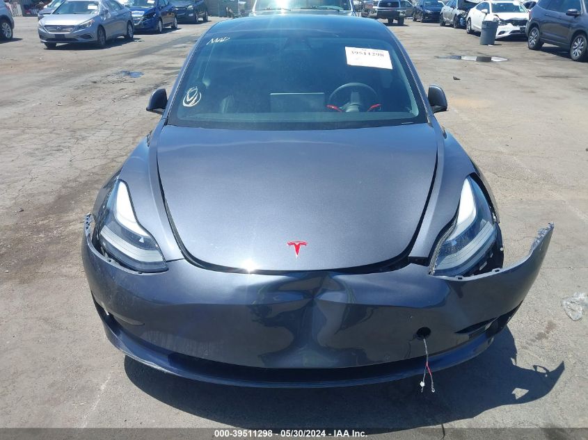 2021 Tesla Model 3 Standard Range Plus Rear-Wheel Drive VIN: 5YJ3E1EA1MF939185 Lot: 39511298