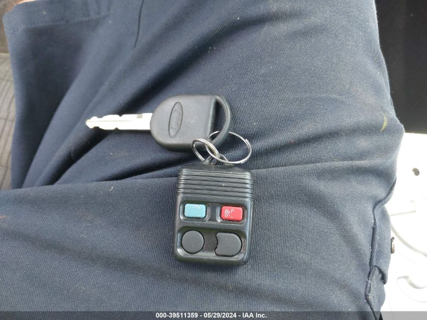 2009 Ford Focus Se VIN: 1FAHP35N99W214540 Lot: 39511359