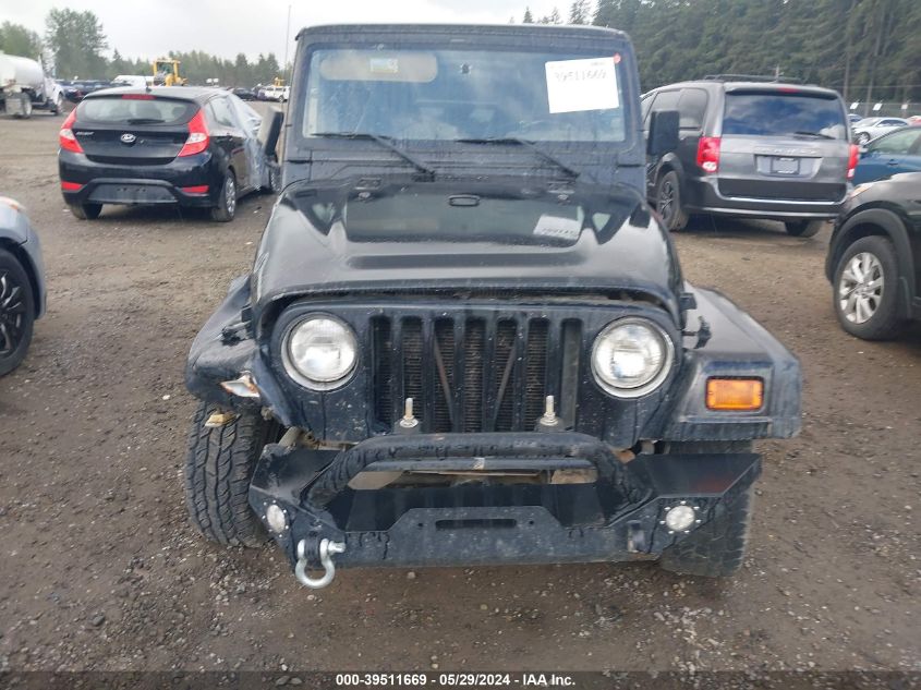 2000 Jeep Wrangler Sahara VIN: 1J4FA59SXYP704888 Lot: 39511669