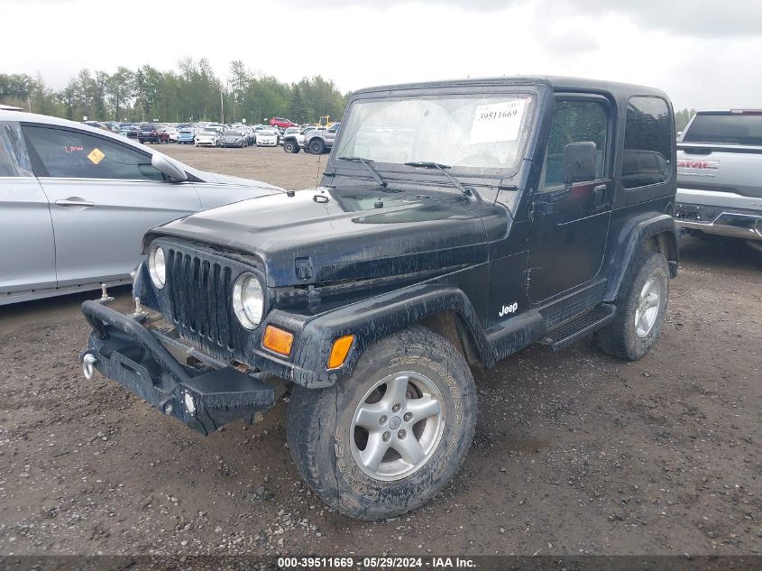 2000 Jeep Wrangler Sahara VIN: 1J4FA59SXYP704888 Lot: 39511669