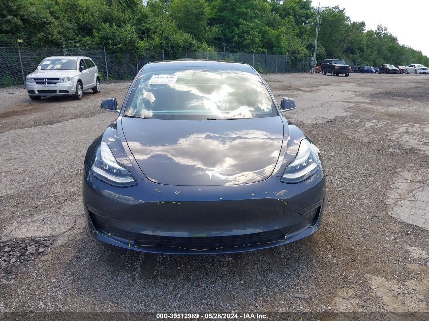 2018 Tesla Model 3 VIN: 5YJ3E1EAXJF052910 Lot: 39512989