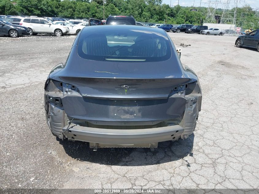 2018 Tesla Model 3 VIN: 5YJ3E1EAXJF052910 Lot: 39512989