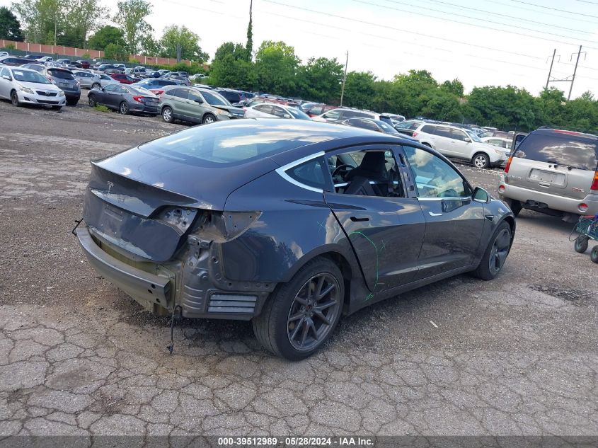 2018 Tesla Model 3 VIN: 5YJ3E1EAXJF052910 Lot: 39512989