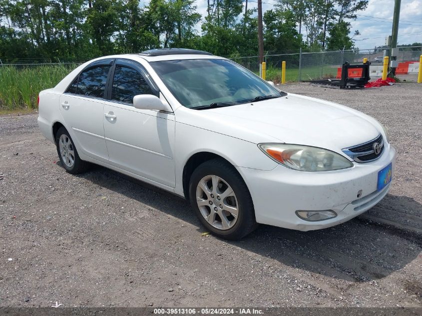 2004 Toyota Camry Le VIN: JTDBE32K640287909 Lot: 39513106