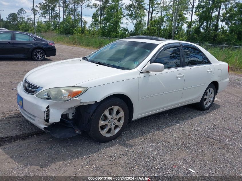 2004 Toyota Camry Le VIN: JTDBE32K640287909 Lot: 39513106