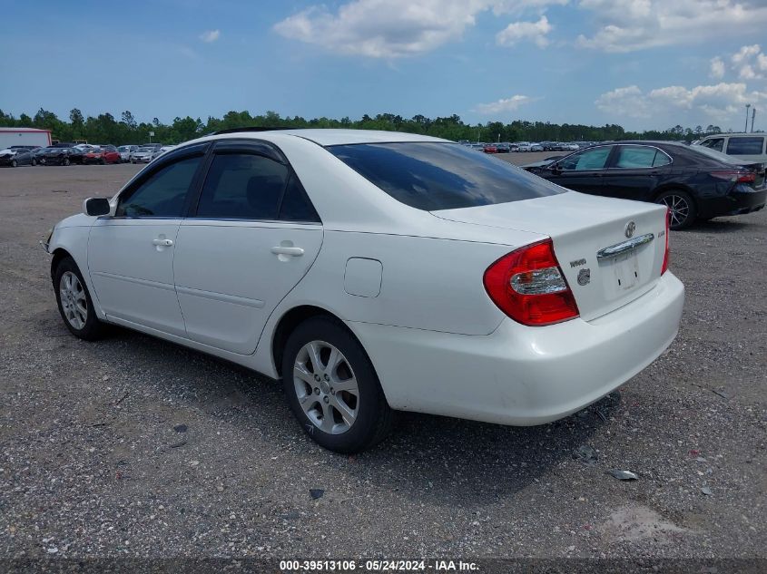 2004 Toyota Camry Le VIN: JTDBE32K640287909 Lot: 39513106