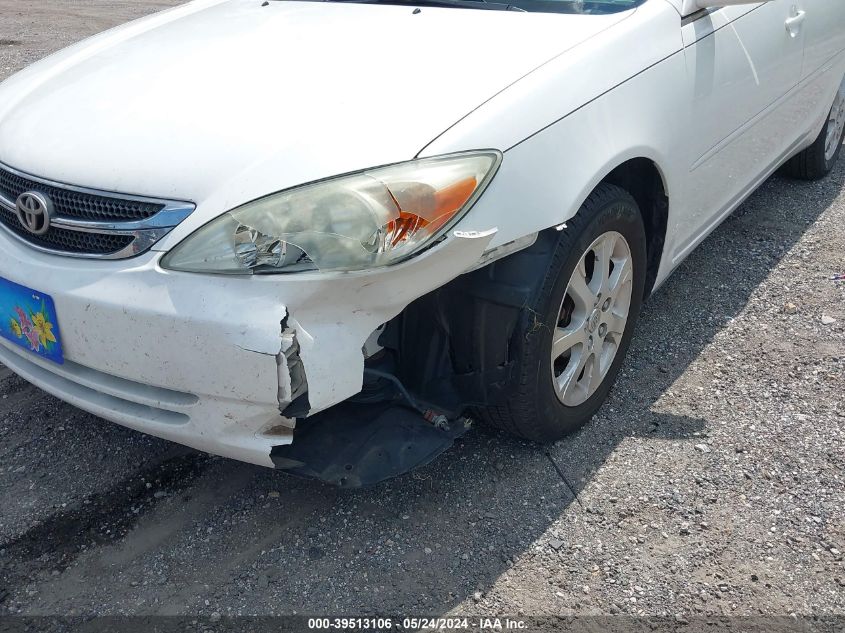 2004 Toyota Camry Le VIN: JTDBE32K640287909 Lot: 39513106