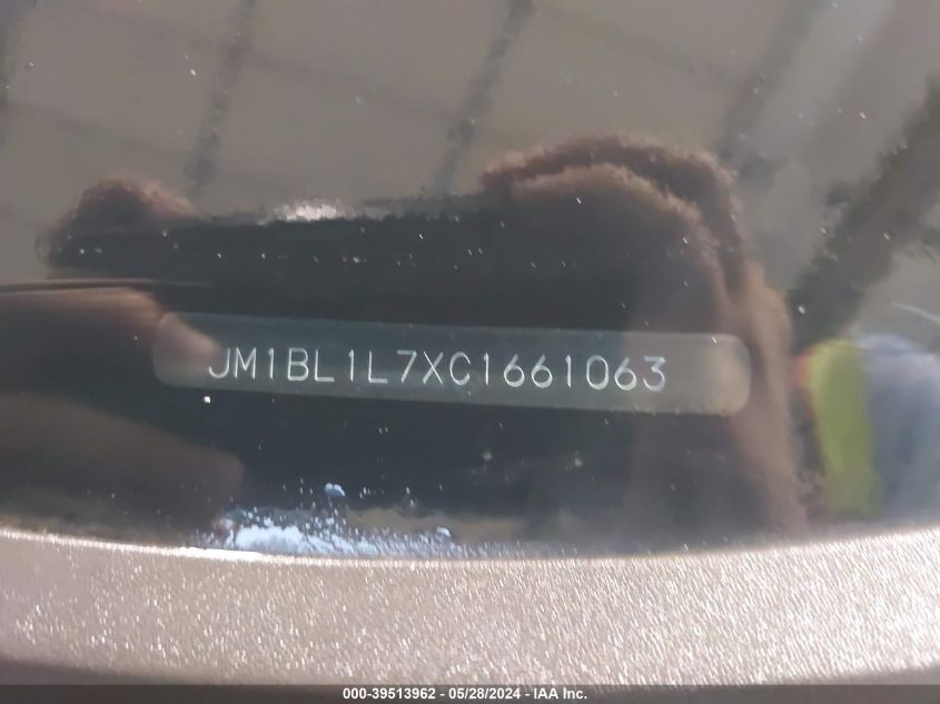 2012 Mazda Mazda3 I Touring VIN: JM1BL1L7XC1661063 Lot: 39513962