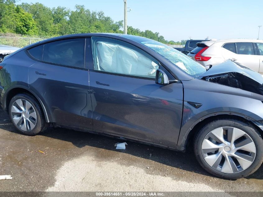 2023 Tesla Model Y Awd/Long Range Dual Motor All-Wheel Drive VIN: 7SAYGDEE8PA198655 Lot: 39514651