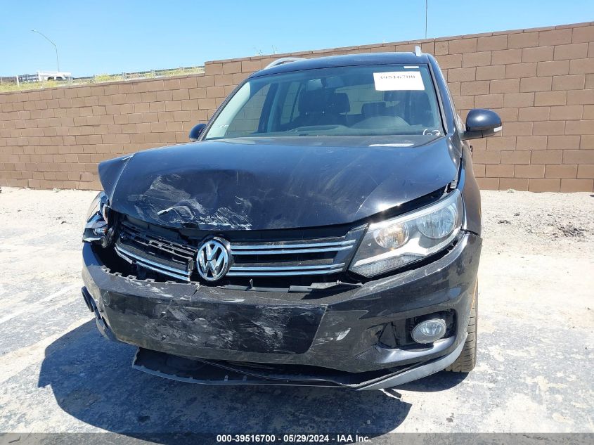 2014 Volkswagen Tiguan Sel VIN: WVGAV3AX0EW560491 Lot: 39516700