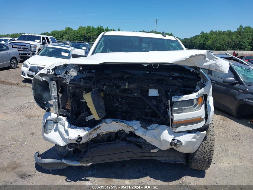 2018 Chevrolet Silverado 1500 2Lt VIN: 3GCUKREC3JG366552 Lot: 39517515