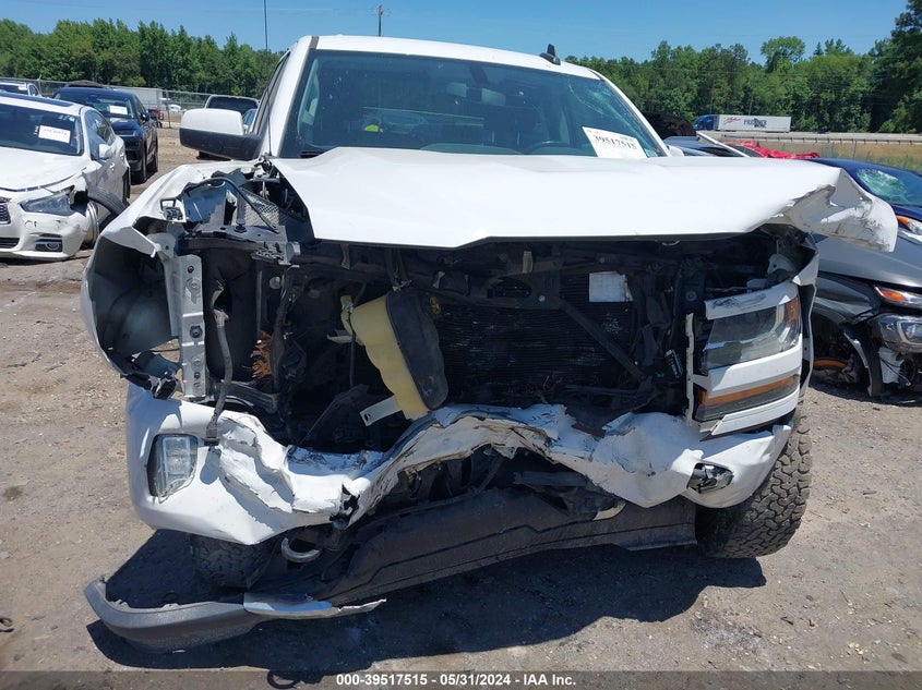 2018 Chevrolet Silverado 1500 2Lt VIN: 3GCUKREC3JG366552 Lot: 39517515