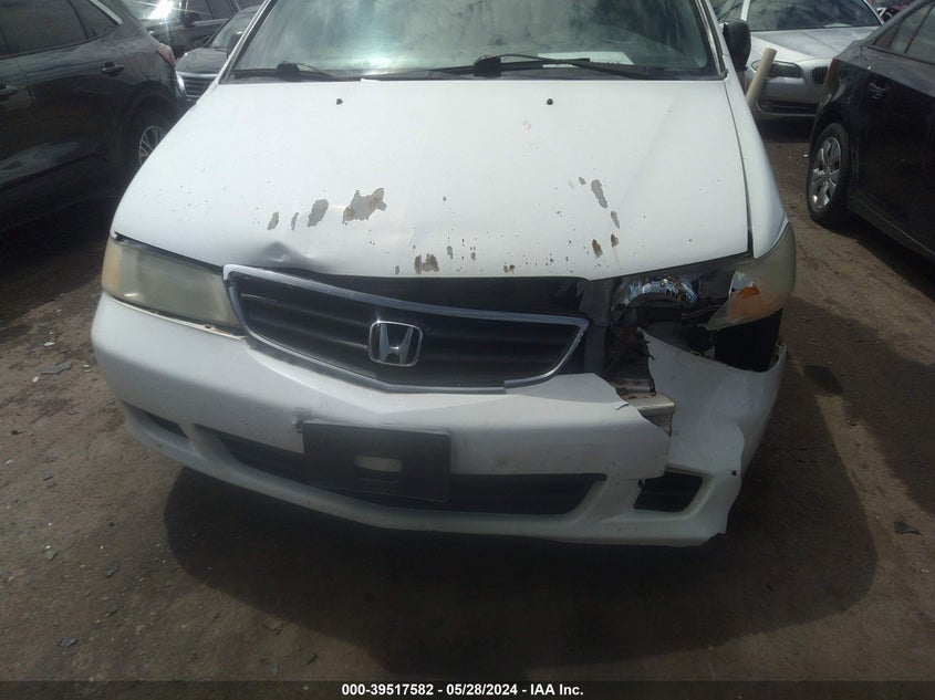 2004 Honda Odyssey Lx VIN: 5FNRL18544B060391 Lot: 39517582