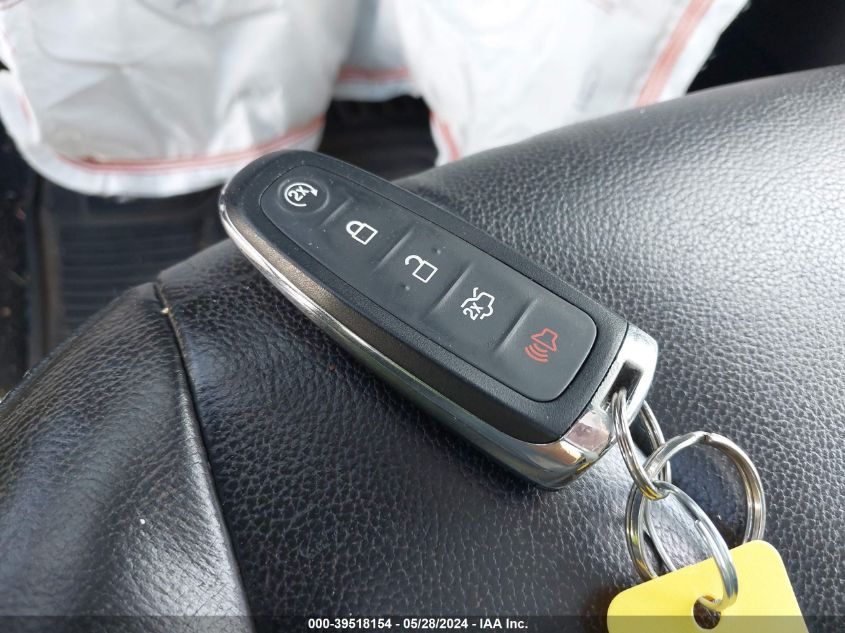 2015 Ford Focus Titanium VIN: 1FADP3J29FL377843 Lot: 39518154