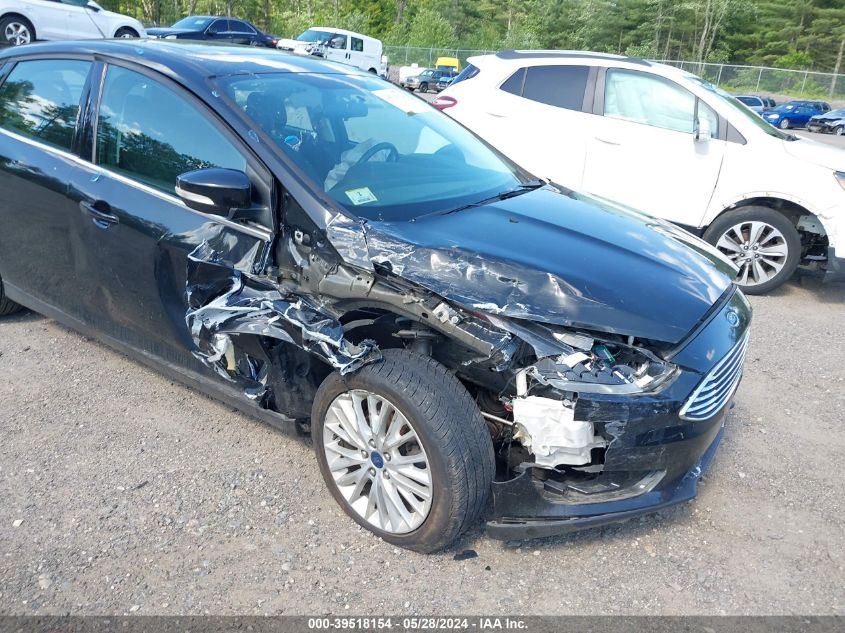 2015 Ford Focus Titanium VIN: 1FADP3J29FL377843 Lot: 39518154