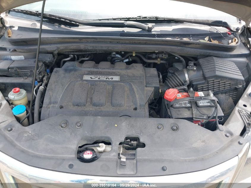 2010 Honda Odyssey Touring VIN: 5FNRL3H90AB055702 Lot: 39518164