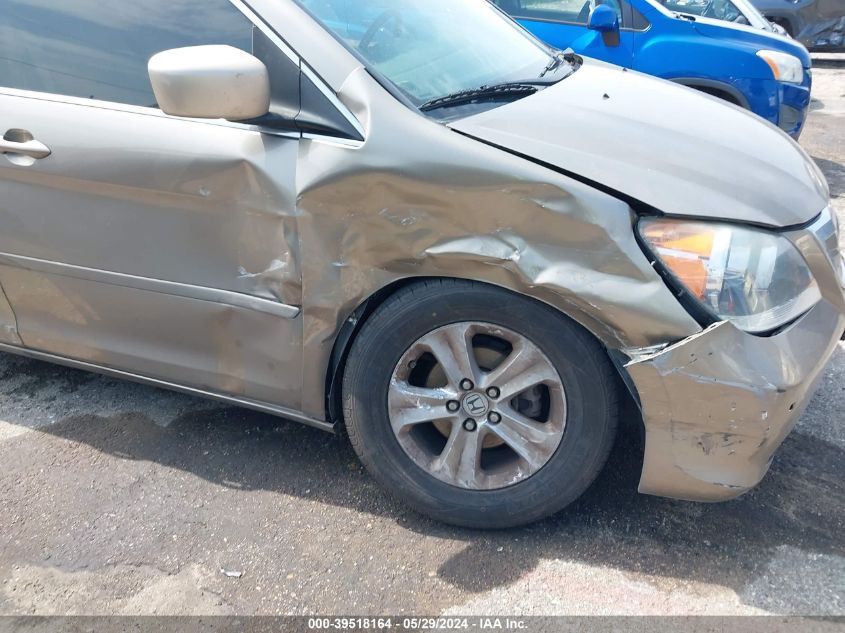 2010 Honda Odyssey Touring VIN: 5FNRL3H90AB055702 Lot: 39518164