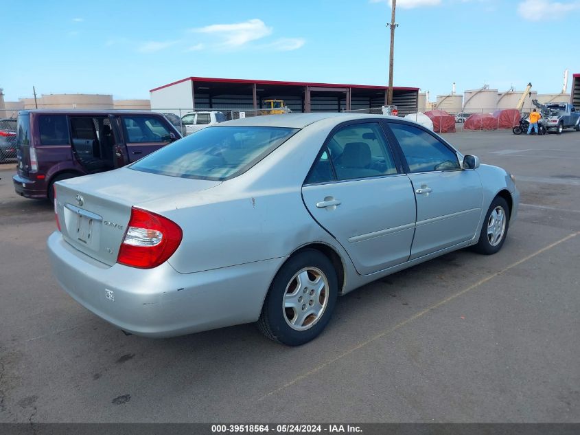 2002 Toyota Camry Le V6 VIN: 4T1BF32K12U013581 Lot: 39518564