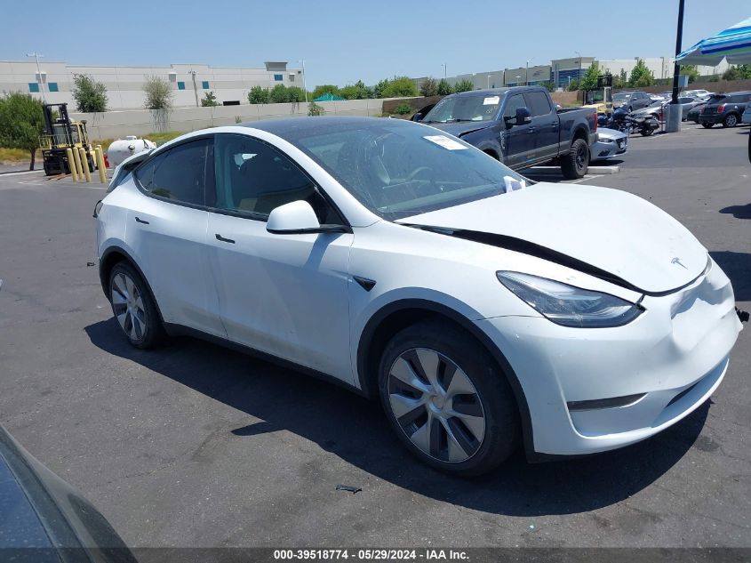 2023 Tesla Model Y Awd/Long Range Dual Motor All-Wheel Drive VIN: 7SAYGDEE3PA031197 Lot: 39518774