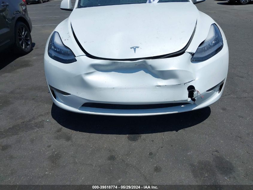 2023 Tesla Model Y Awd/Long Range Dual Motor All-Wheel Drive VIN: 7SAYGDEE3PA031197 Lot: 39518774