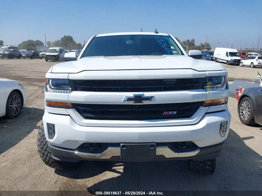 2018 Chevrolet Silverado 1500 2Lt VIN: 3GCUKREC4JG520427 Lot: 39519637