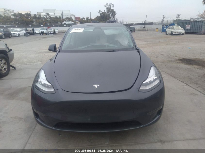 2023 Tesla Model Y Awd/Long Range Dual Motor All-Wheel Drive VIN: 7SAYGDEE0PA044909 Lot: 39519654