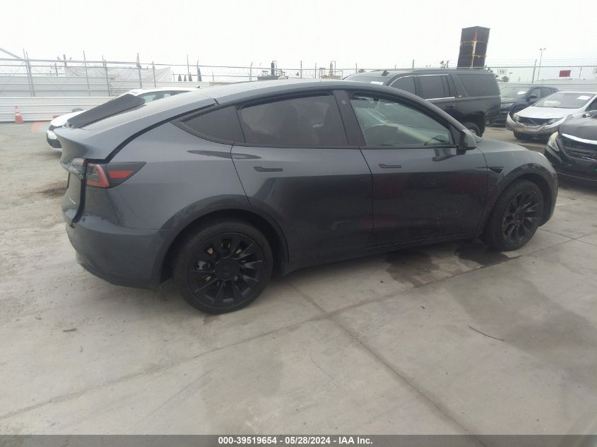 2023 Tesla Model Y Awd/Long Range Dual Motor All-Wheel Drive VIN: 7SAYGDEE0PA044909 Lot: 39519654