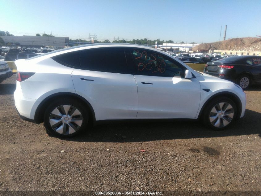 2023 Tesla Model Y Awd/Long Range Dual Motor All-Wheel Drive VIN: 7SAYGDEE3PA030597 Lot: 39520036