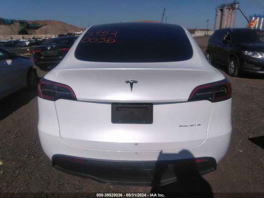 2023 Tesla Model Y Awd/Long Range Dual Motor All-Wheel Drive VIN: 7SAYGDEE3PA030597 Lot: 39520036