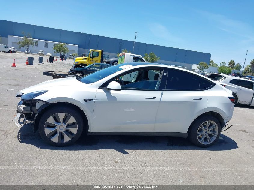 2023 Tesla Model Y Awd/Long Range Dual Motor All-Wheel Drive VIN: 7SAYGDEE2PF869336 Lot: 39520413