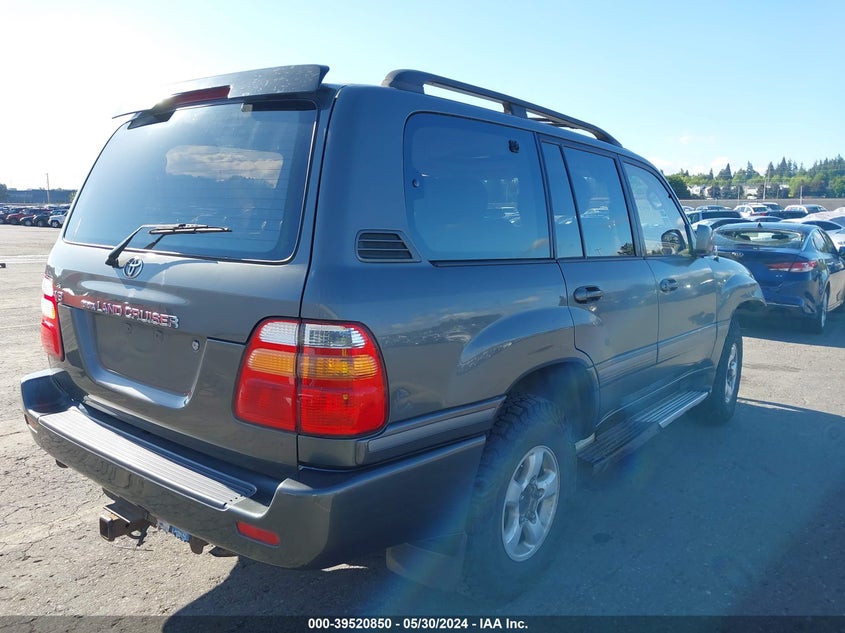 1999 Toyota Land Cruiser VIN: JT3HT05J6X0058303 Lot: 39520850