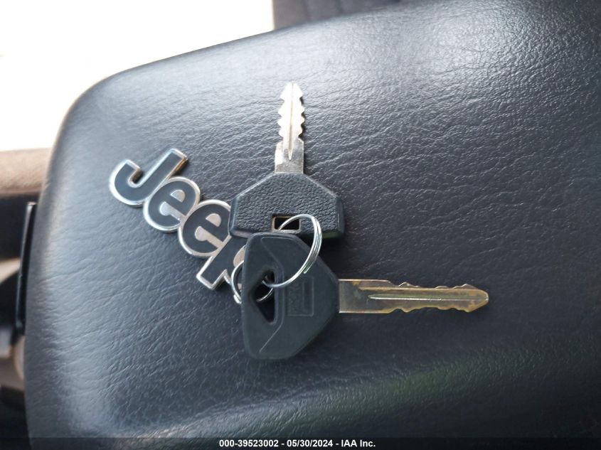 2001 Jeep Cherokee Sport VIN: 1J4FF48SX1L619415 Lot: 39523002