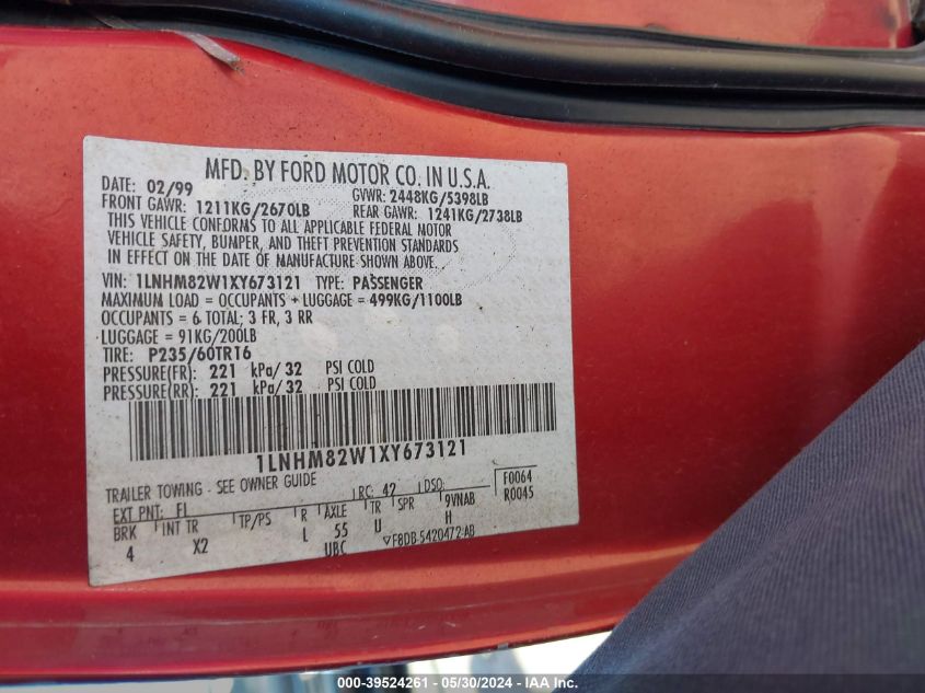 1999 Lincoln Town Car Signature VIN: 1LNHM82W1XY673121 Lot: 39524261