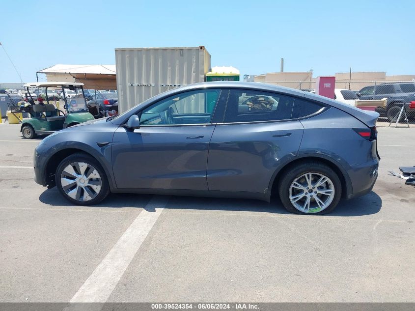 2023 Tesla Model Y Awd/Long Range Dual Motor All-Wheel Drive VIN: 7SAYGDEE8PF936957 Lot: 39524354