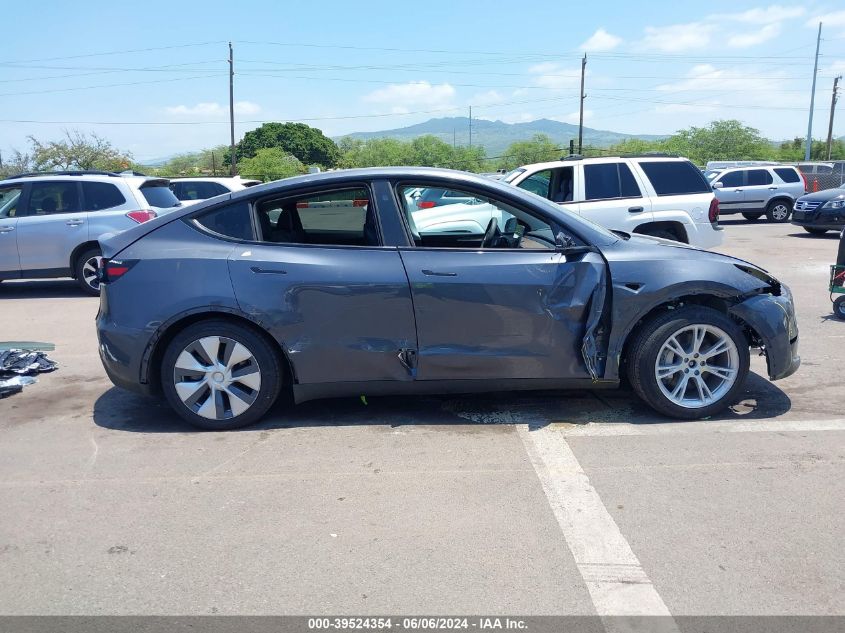 2023 Tesla Model Y Awd/Long Range Dual Motor All-Wheel Drive VIN: 7SAYGDEE8PF936957 Lot: 39524354