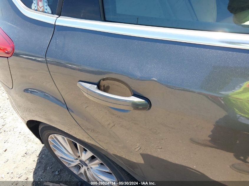 2016 Ford Focus Titanium VIN: 1FADP3N28GL260007 Lot: 39524714