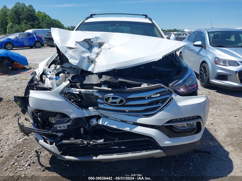 2018 Hyundai Santa Fe Sport 2.4L VIN: 5NMZU3LB9JH095783 Lot: 39526442