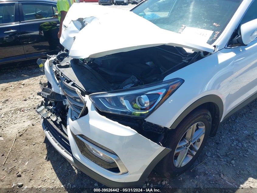 2018 Hyundai Santa Fe Sport 2.4L VIN: 5NMZU3LB9JH095783 Lot: 39526442