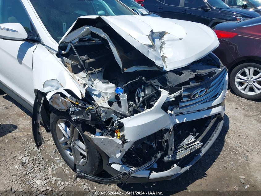 2018 Hyundai Santa Fe Sport 2.4L VIN: 5NMZU3LB9JH095783 Lot: 39526442