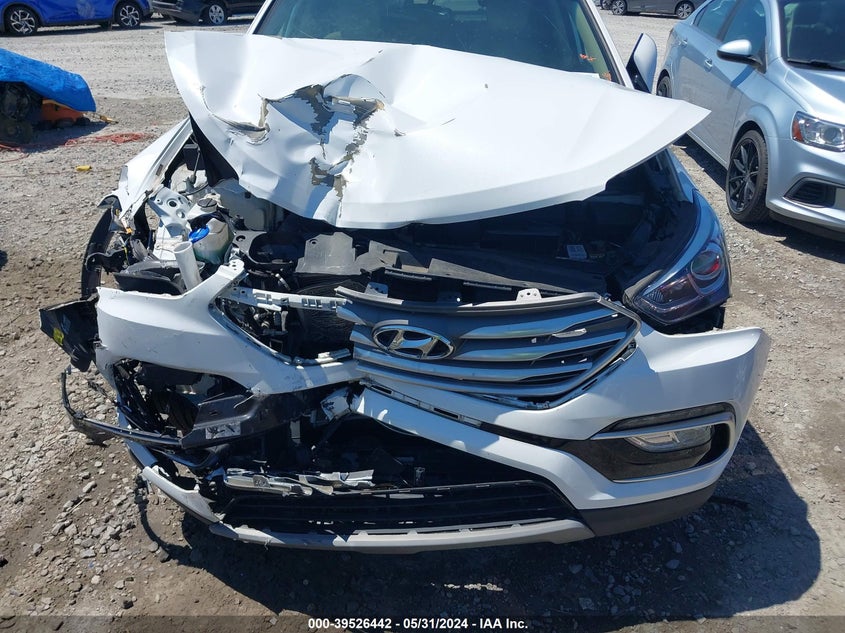 2018 Hyundai Santa Fe Sport 2.4L VIN: 5NMZU3LB9JH095783 Lot: 39526442