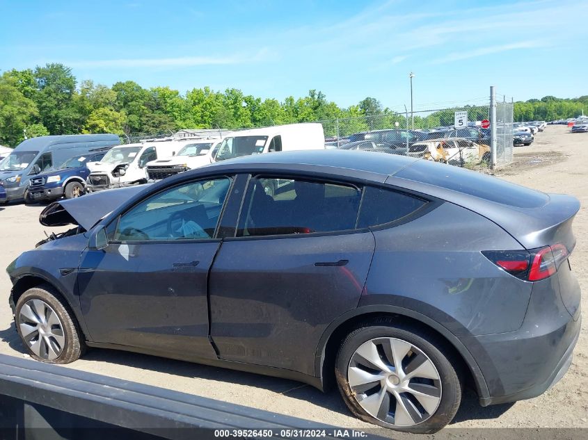 2023 Tesla Model Y Awd/Long Range Dual Motor All-Wheel Drive VIN: 7SAYGDEE6PA208129 Lot: 39526450