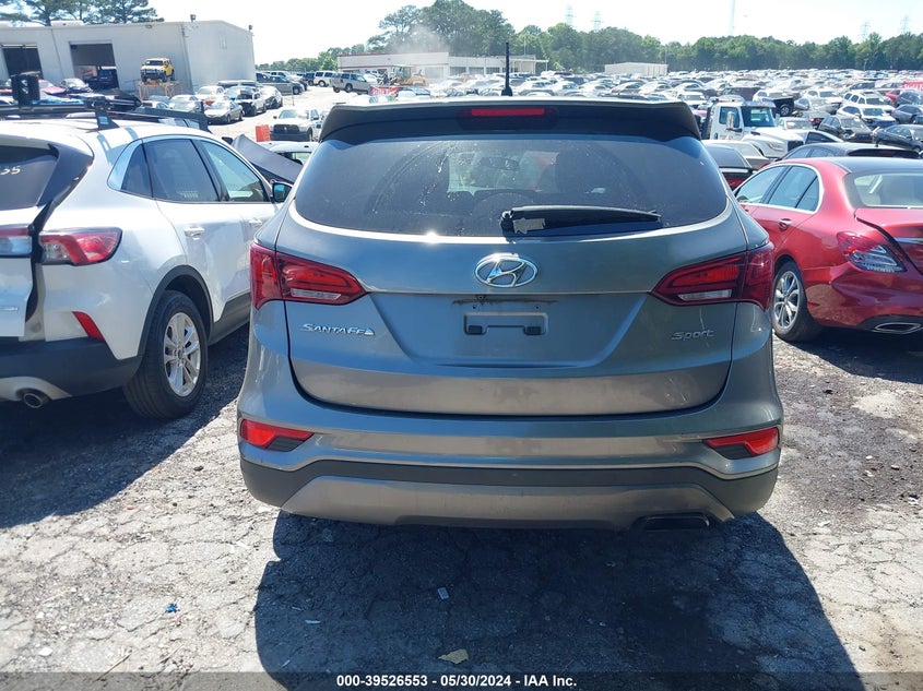 2018 Hyundai Santa Fe Sport 2.4L VIN: 5NMZT3LB0JH059743 Lot: 39526553