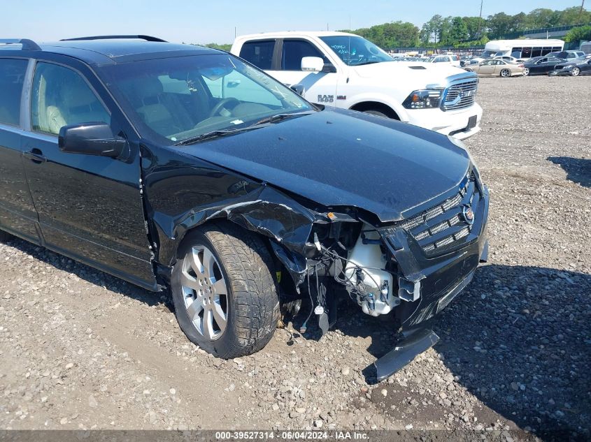 2009 Cadillac Srx V6 VIN: 1GYEE437290141313 Lot: 39527314