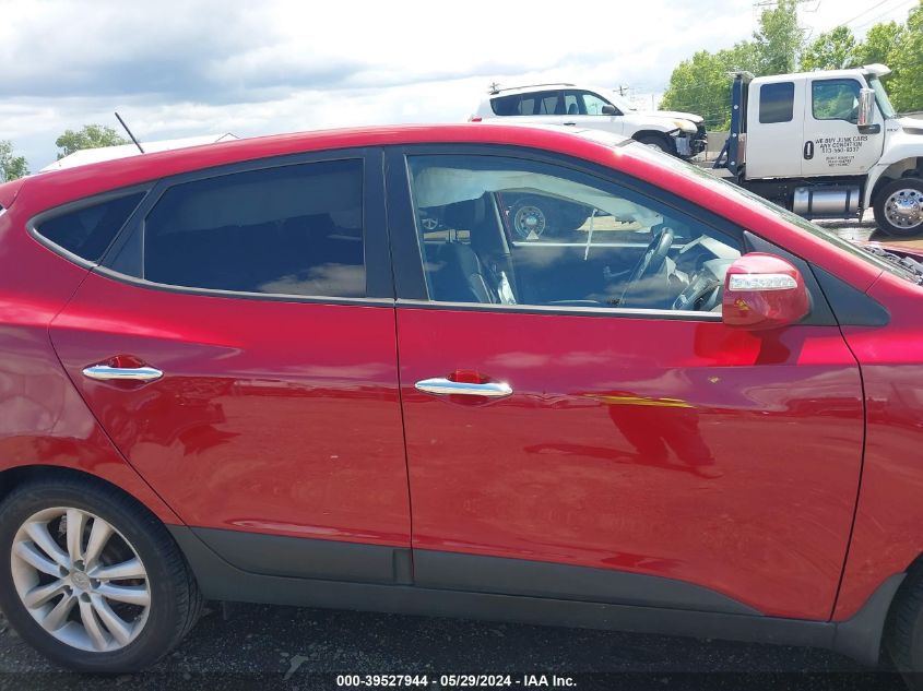 2012 Hyundai Tucson Limited VIN: KM8JUCACXCU404970 Lot: 39527944