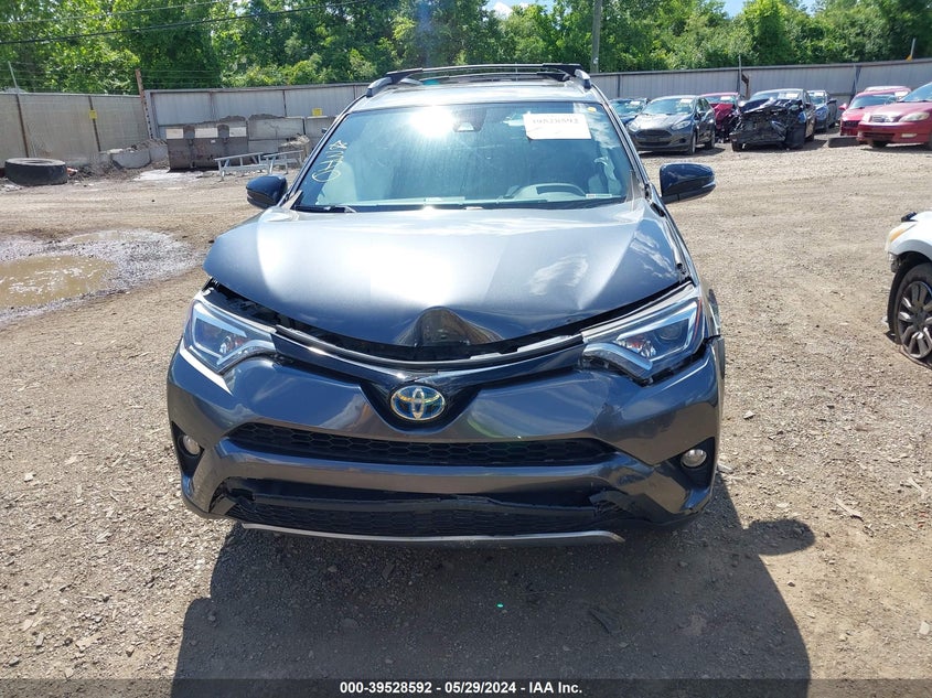 2018 TOYOTA RAV4 HYBRID SE - JTMJJREV2JD187083