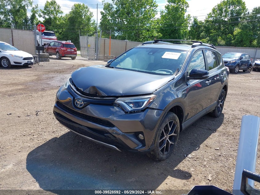 2018 TOYOTA RAV4 HYBRID SE - JTMJJREV2JD187083