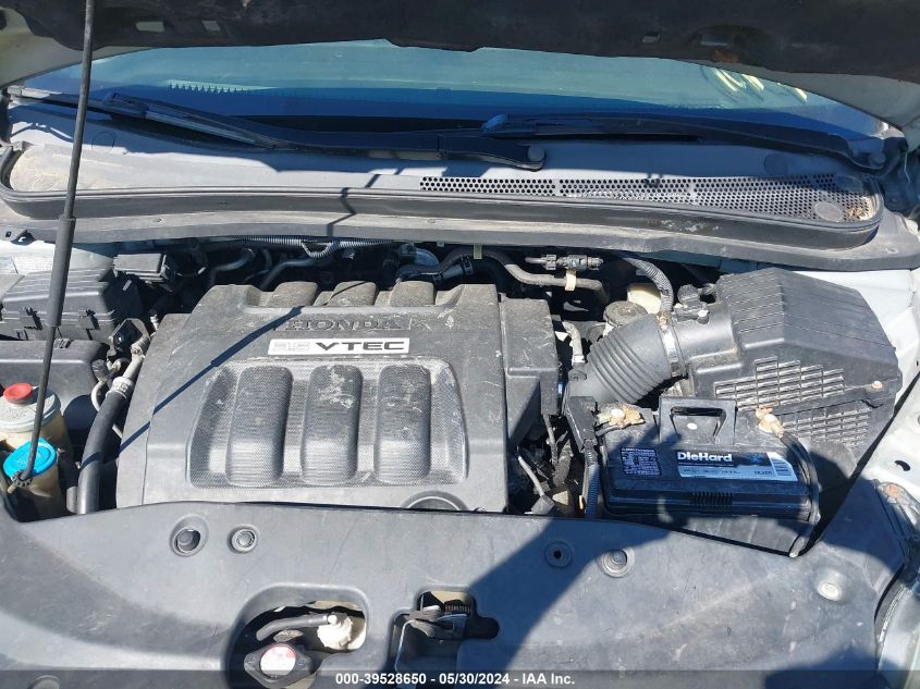 2007 Honda Odyssey Ex VIN: 5FNRL384X7B086713 Lot: 39528650