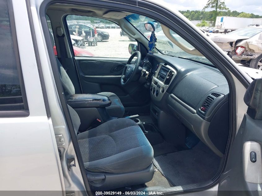 2003 Mazda Tribute Lx V6 VIN: 4F2YZ04103KM07126 Lot: 39529149